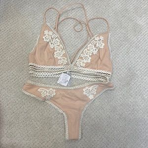 New with tags! Matching Free People lingerie set. Never tried on or worn.